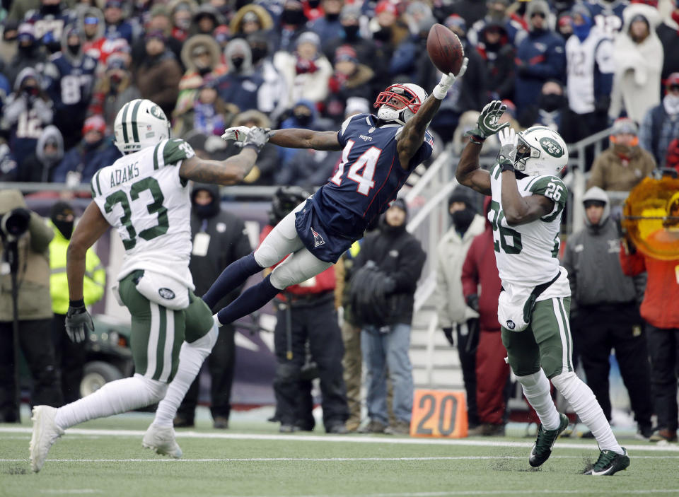 <p>New England Patriots wide receiver Brandin Cooks (14) can’t make a catch between New York Jets safeties Jamal Adams (33) and Marcus Maye (26) during the first half of an NFL football game, Sunday, Dec. 31, 2017, in Foxborough, Mass. (AP Photo/Steven Senne) </p>