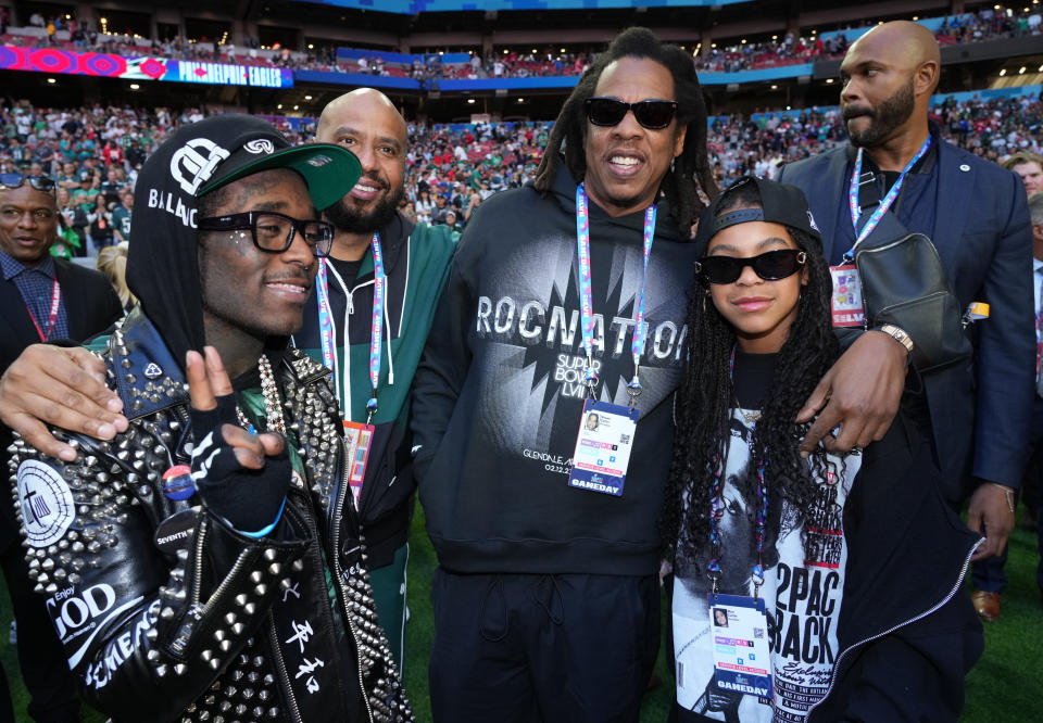 GLENDALE, ARIZONA - FEBRUARY 12:  (L-R) Lil Uzi Vert, Jay-Z and Blue Ivy Carter attend Super Bowl LVII at State Farm Stadium on February 12, 2023 in Glendale, Arizona. (Photo by Kevin Mazur/Getty Images for Roc Nation)
