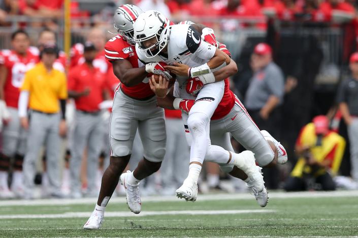 Cincinnati Bearcats quarterback Desmond Ridder (9) carries the ball in the second quarter of a college football game against the Ohio State Buckeyes, Saturday, Sept. 7, 2019, at Ohio Stadium in Columbus. 