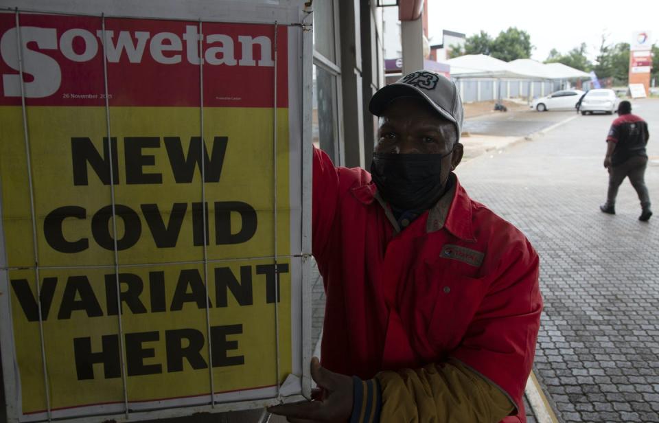 man with newspaper cheet on display