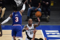 San Antonio Spurs' DeMar DeRozan (10) passes around New York Knicks' Nerlens Noel (3) during the first half of an NBA basketball game Thursday, May 13, 2021, in New York. (AP Photo/Frank Franklin II, Pool)