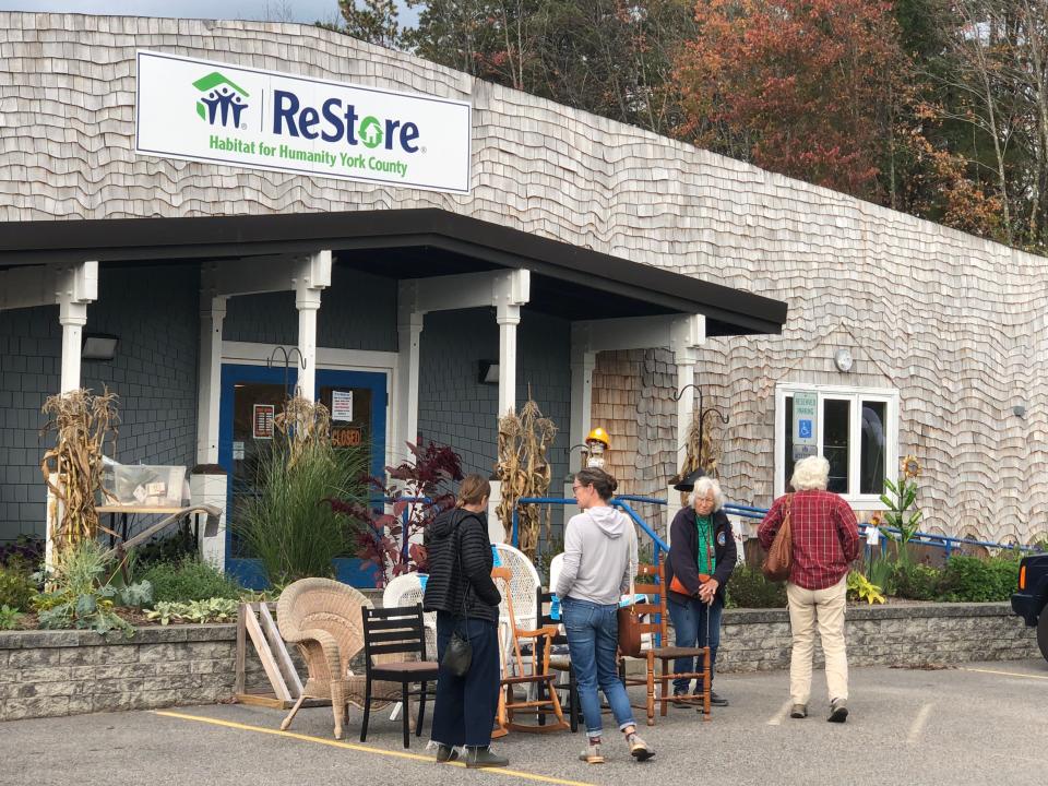 Shoppers browse outside as they wait for the ReStore to open on Route 1 in Kennebunk. The store is run by Habitat for Humanity York County.