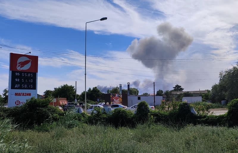 Smoke rises after explosions were heard near Novofedorivka