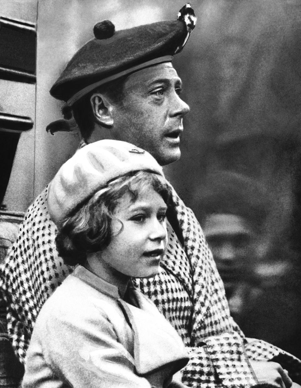 FILE - Britain's Princess Elizabeth rides with her uncle, Prince Edward, during a visit to Balmoral, Sctoland, 1933. Queen Elizabeth II will mark 70 years on the throne Sunday, Feb. 6, 2022 an unprecedented reign that has made her a symbol of stability as the United Kingdom navigated an age of uncertainty. Elizabeth, now 95, was expected to live the life of a minor royal when she was born. But everything changed a decade later when her uncle, King Edward VIII, abdicated so he could marry the American divorcee Wallis Simpson. (AP Photo, File)