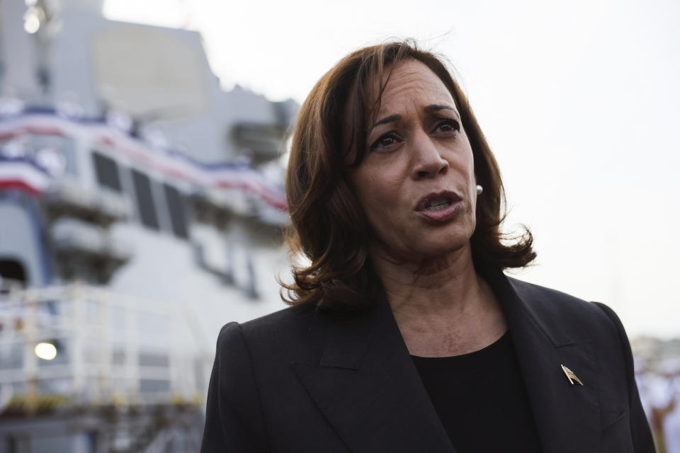 U.S. Vice President Kamala Harris talks to the media at Yokosuka Naval Base, in Yokosuka, near Tokyo, Wednesday, Sept. 28, 2022. Standing on the deck of an American destroyer at a naval base here on Wednesday, Vice President Kamala Harris directly challenged China by pledging that the United States would “continue to deepen our unofficial ties” to the disputed island of Taiwan. (Leah Millis/Pool Photo via AP)