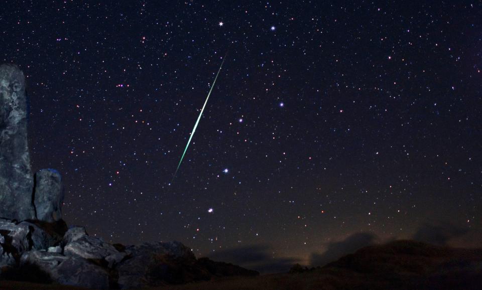 A Geminid fireball explodes over the Mojave Desert in California on Dec. 13, 2009.