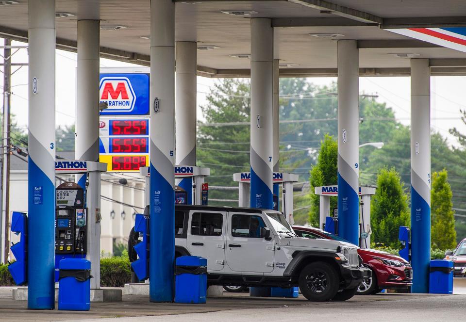 Cars pull in for gas at the Marathon station on South Walnut Street on Tuesday, June 7, 2022.