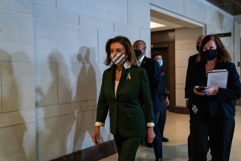 WASHINGTON, DC - SEPTEMBER 13: Speaker of the House Nancy Pelosi (D-CA) arrives for a classified briefing by U.S. Capitol Police Chief J. Thomas Manger for congressional leaders on the security preparations being arranged for the Capitol Complex ahead of a rally taking place over the coming weekend on Capitol Hill on Monday, Sept. 13, 2021 in Washington, DC. Chief Manger says that temporary security fencing around the Capitol Building would go up ahead of the "Justice for J6" rally which is expected to draw people calling for justice for those arrested after the violent insurrection on January 6th, earlier this year. (Kent Nishimura / Los Angeles Times)