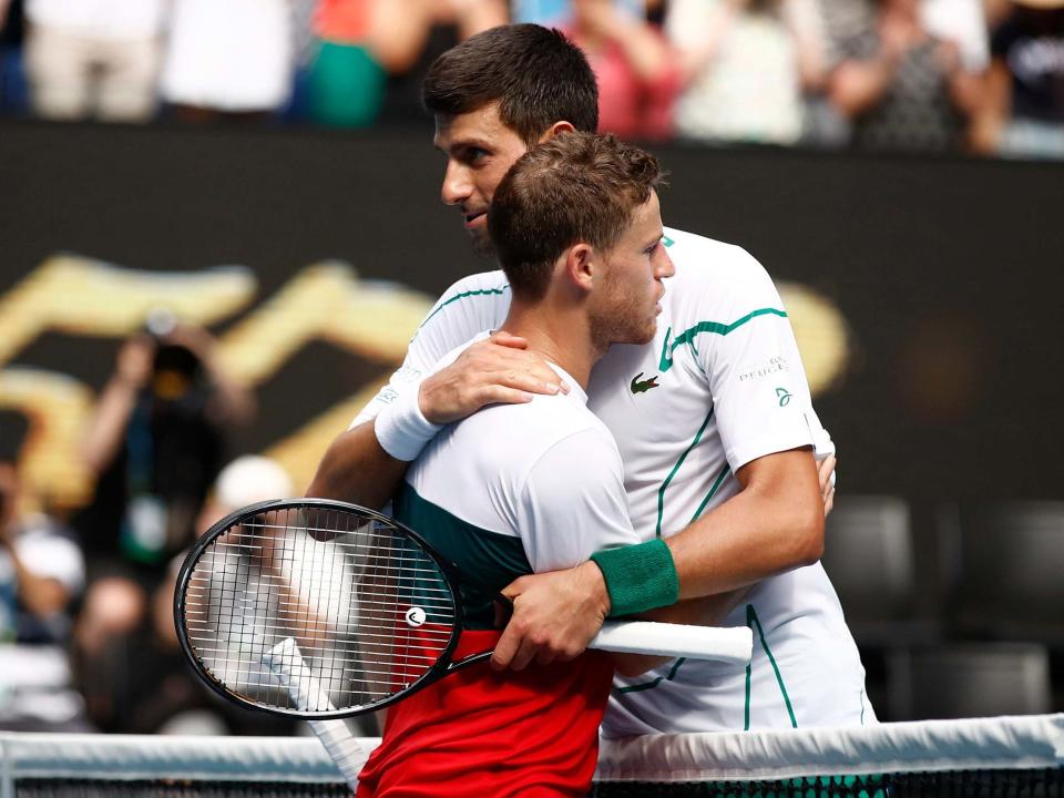 Novak Djokovic embarces Diego Schwartzman on Rod Laver Arena: Getty