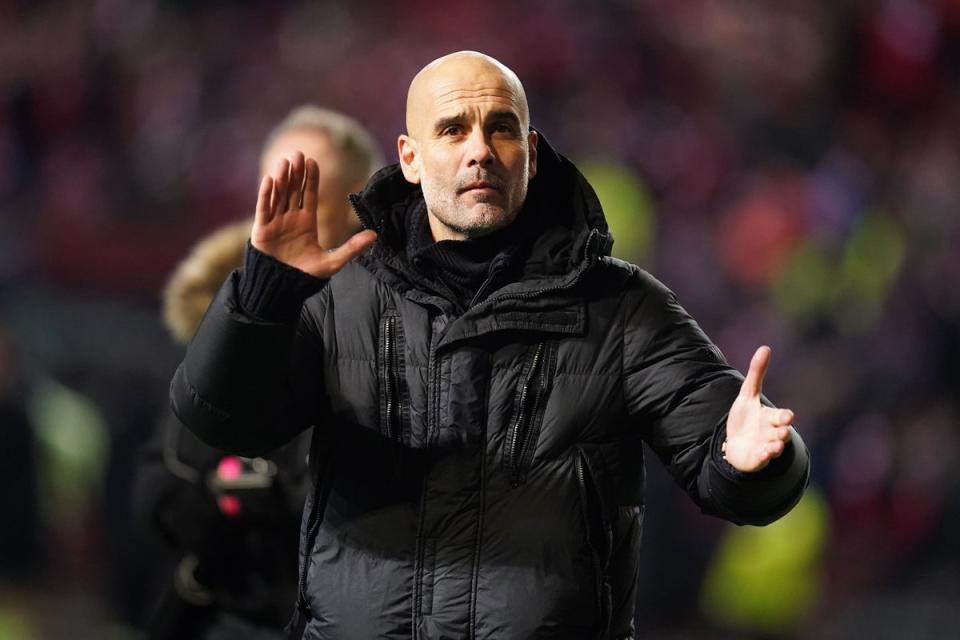 Manchester City manager Pep Guardiola celebrates after his side’s 3-0 FA Cup victory at Bristol City (Adam Davy/PA) (PA Wire)