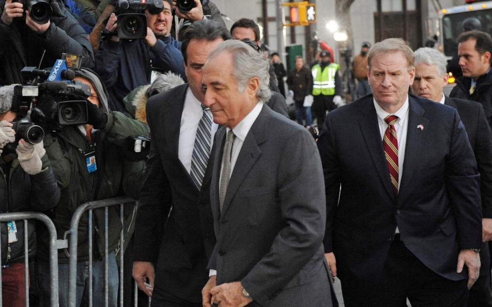 Bernard Madoff arrives at Manhattan federal court, Thursday, March 12, 2009, in New York. - AP