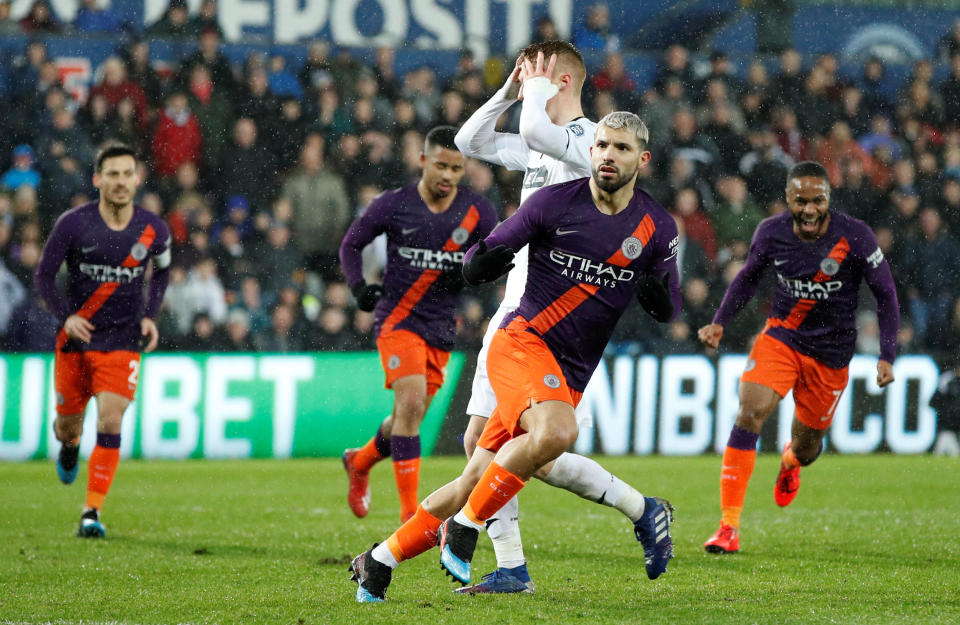 Soccer Football - FA Cup Quarter Final - Swansea City v Manchester City - Liberty Stadium, Swansea, Britain - March 16, 2019  Manchester City's Sergio Aguero celebrates scoring their second goal from the penalty spot             Action Images via Reuters/John Sibley