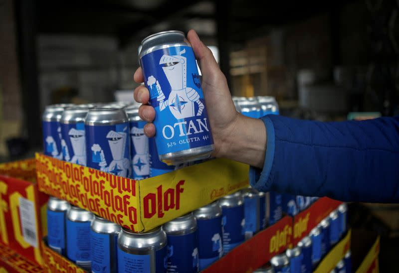 FILE PHOTO: Nato-branded OTAN beer cans by Olaf Brewing Company are pictured in Savonlinna