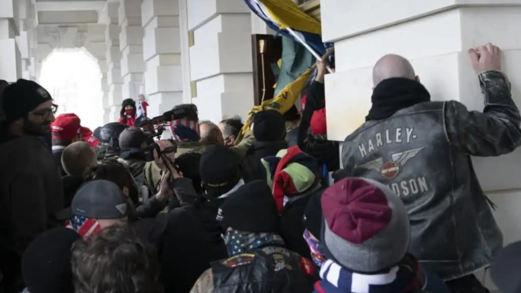Supporters of then-President Donald Trump try to open a door of the U.S. Capitol as they riot on Jan. 6, 2021. Recent comments by Trump are validating concerns of more political violence. (Photo: Jose Luis Magana/AP, File)