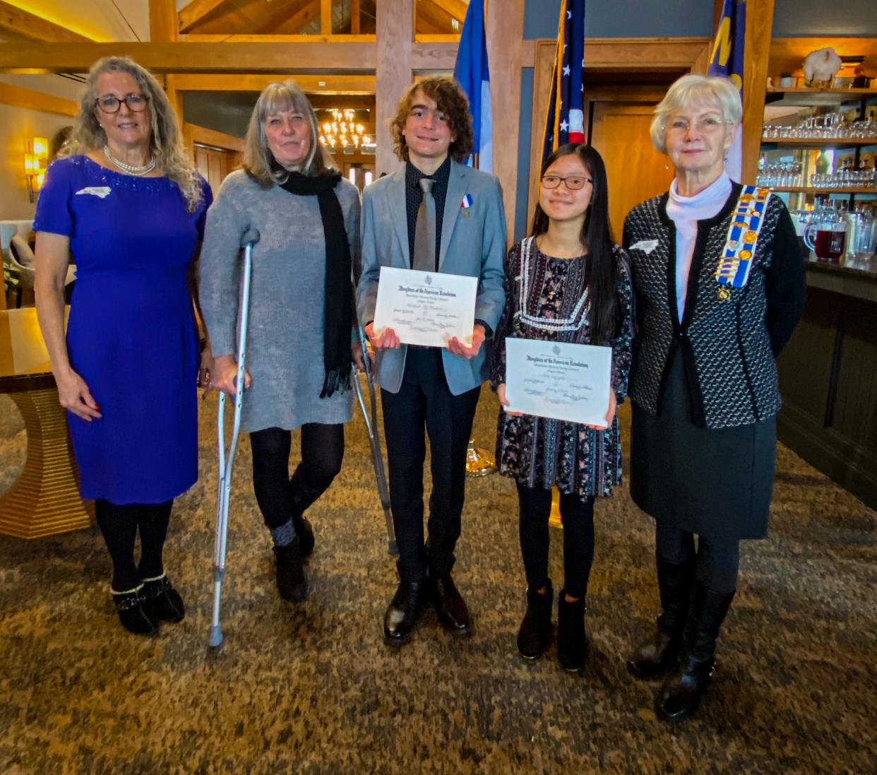 (From left) Regent Sharon Horan, Classical Scholars teacher Yvonne Krowka, Michael McMullen, Ava Wright, and American History Essay Chair Laura Lee Jordan at the Jan. 14 ceremony.