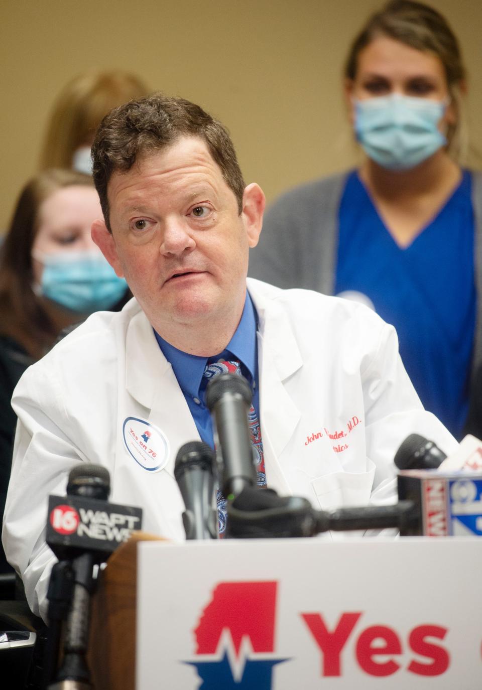 Dr. John W. Gaudet, a pediatrics specialist in Hattiesburg, speaks during a press conference about the launch of the Yes On 76 campaign at the Mississippi Hospital Association in Madison, Miss., Tuesday, May 11, 2021. On Tuesday, the House Medicaid Committee passed a bill to expand Medicaid.