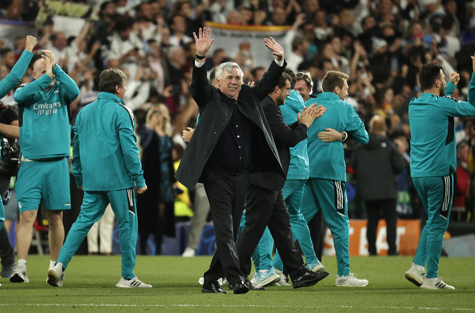 Pictured centre, Real Madrid coach Carlo Ancelotti celebrating after the Champions League semi-final victory over Manchester City. 