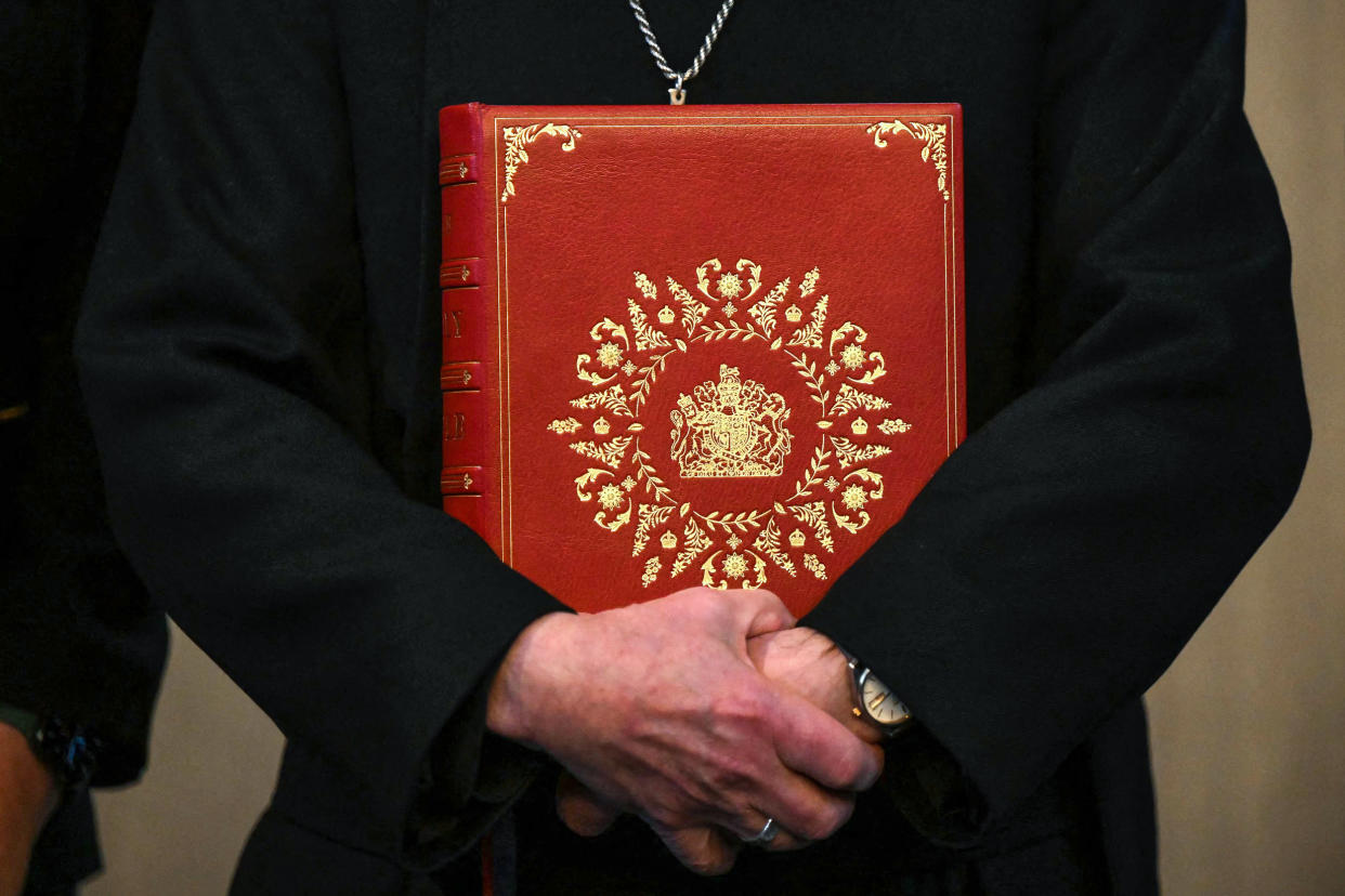 Image: The Coronation Bible, a specially commissioned Bible which will be used during the Coronation Service when The King takes the Coronation Oath, held by The Archbishop of Canterbury Justin Welby, in Lambeth Palace in London on April 20, 2023. (Daniel Leal / AFP - Getty Images)