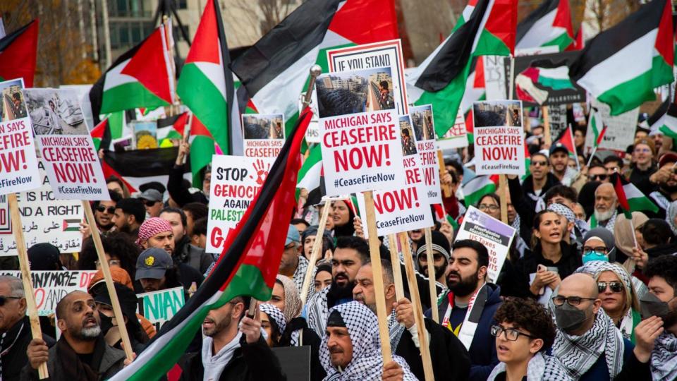 PHOTO: Protesters hold Palestinian flags and placards during a Cease Fire on Gaza rally, Oct. 28, 2023, in Detroit. (Matthew Hatcher/SOPA Images/LightRocket via Getty Images, FILE)