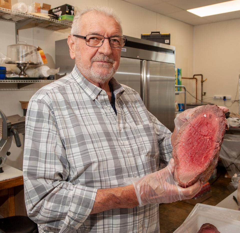 In Northborough, Hillside Grill owner Dimitrios Voyiatzis with famous roast beef, Oct. 13, 2022. 