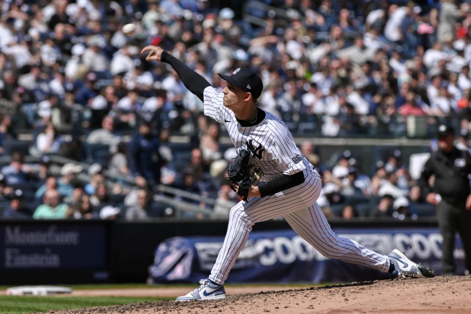 Apr 20, 2024; Bronx, New York, USA; New York Yankees pitcher Luke Weaver (30) pitches during a game against the Tampa Bay Rays at Yankee Stadium. Mandatory Credit: John Jones-USA TODAY Sports