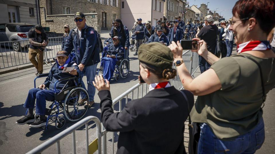 U.S. veterans parade during a gathering in preparation of the 79th D-Day anniversary in Sainte-Mere-Eglise, Normandy, France, Sunday, June 4, 2023. (Thomas Padilla/AP)