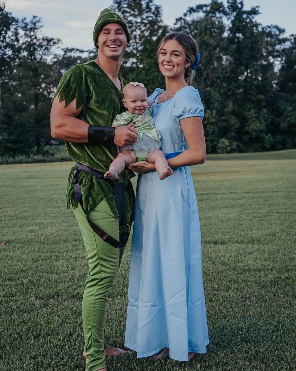 <p>Tinkerbell's first Halloween! The Duck Dynasty alum and her husband Christian Huff were dead ringers for <a href="https://people.com/parents/sadie-robertson-family-peter-pan-costume-honey-as-tinkerbell-photos/" rel="nofollow noopener" target="_blank" data-ylk="slk:Peter Pan and Wendy Darling;elm:context_link;itc:0;sec:content-canvas" class="link ">Peter Pan and Wendy Darling</a>, with their 5-month-old daughter Honey making an appearance at Tink. Roberston revealed that her daughter was wearing her own, now 22 years old, and posting photos from then and now.</p> <p>"This very same tink costume has been making dreams come true for 22 years… you know what they say… when you wish upon a star ✨💚," the new mom wrote.</p>