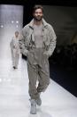 A model wears a creation as part of the Giorgio Armani Men's Spring Summer 2025 collection, that was presented in Milan, Italy, Monday, June 17, 2024. (AP Photo/Luca Bruno).