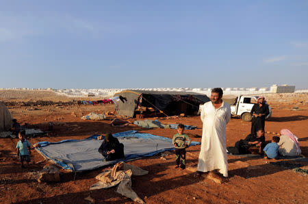 Newly displaced Syrians arrive to a refugee camp in Atimah village, Idlib province, Syria September 11, 2018. REUTERS/ Khalil Ashawi