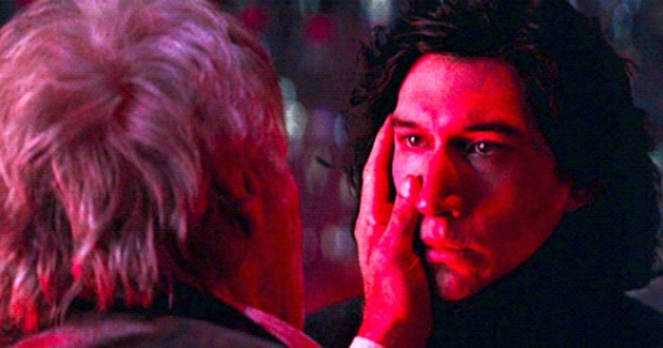 Han Solo touches Kylo Ren's face in The Force Awakens.