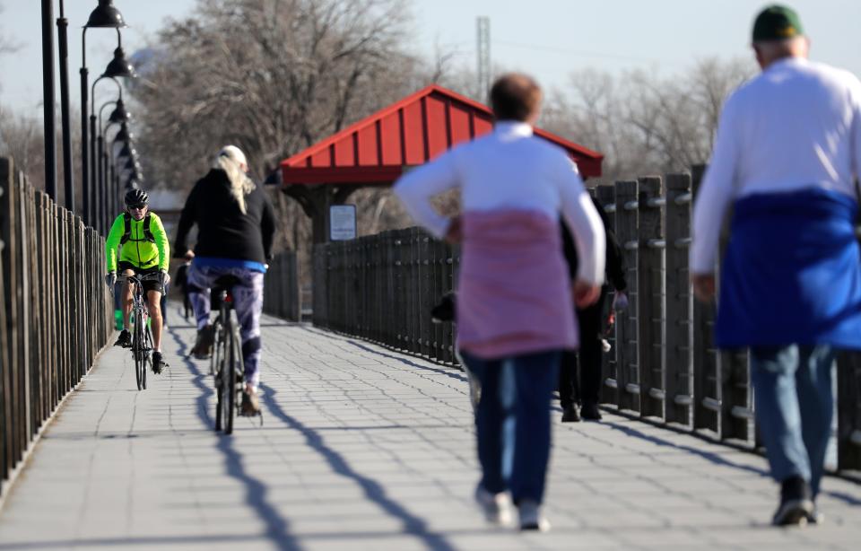 The Fox Cities Trestle-Friendship Trail is full of activity on an unseasonably warm day Wednesday, November 15, 2023, in Fox Crossing, Wis.