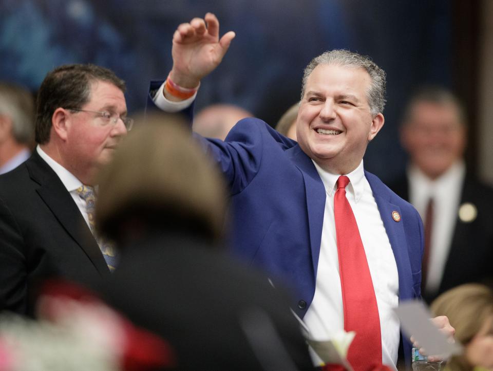 Chief Financial Officer Jimmy Patronis waves as he enters the House of Representatives Tuesday, Jan. 11, 2022. 