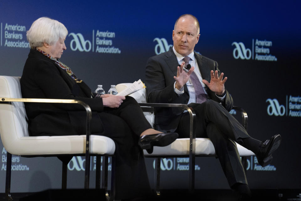 Treasury Secretary Janet Yellen speaks to American Bankers Association President and CEO Rob Nichols, Tuesday, March 21, 2023, in Washington. (AP Photo/Manuel Balce Ceneta)