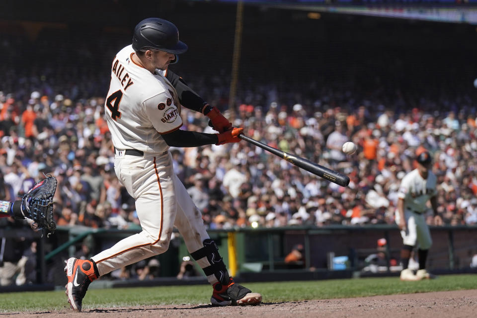 San Francisco Giants' Patrick Bailey hits a two-run home run during the tenth inning of a baseball game against the Texas Rangers in San Francisco, Sunday, Aug. 13, 2023. (AP Photo/Jeff Chiu)