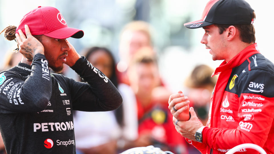 AUSTIN, TEXAS - OCTOBER 21: Second placed Lewis Hamilton of Great Britain and Mercedes talks with Third placed Charles Leclerc of Monaco and Ferrari in parc ferme after the Sprint ahead of the F1 Grand Prix of United States at Circuit of The Americas on October 21, 2023 in Austin, Texas. (Photo by Dan Istitene - Formula 1/Formula 1 via Getty Images)