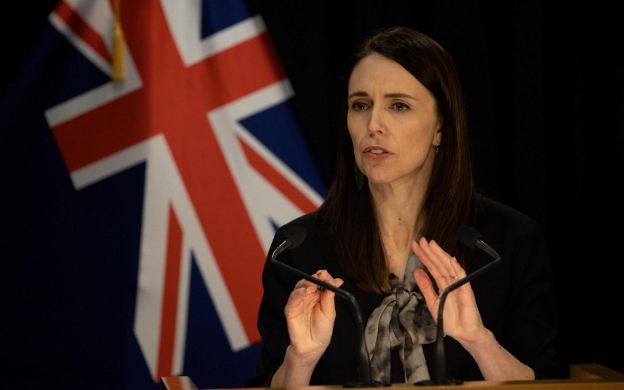 Jacinda Ardern speaks to media regarding the latest case of coronavirus infections - AFP