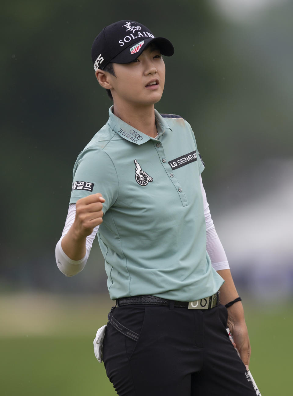 Sung Hyun Park, of South Korea, pumps her fist after sinking a birdie on the 18th hole during the final round of the KPMG Women's PGA Championship golf tournament, Sunday, June 23, 2019, in Chaska, Minn. (AP Photo/Andy Clayton-King)