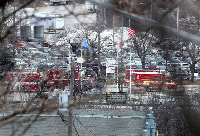 Emergency vehicles are parked near the entrance to Molson Coors headquarters in Milwaukee