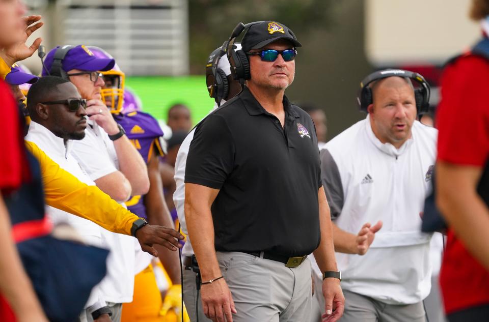 Sep 3, 2022; Greenville, North Carolina, USA;  East Carolina Pirates head coach Mike Houston looks on against the North Carolina State Wolfpack during the second half at Dowdy-Ficklen Stadium. Mandatory Credit: James Guillory-USA TODAY Sports