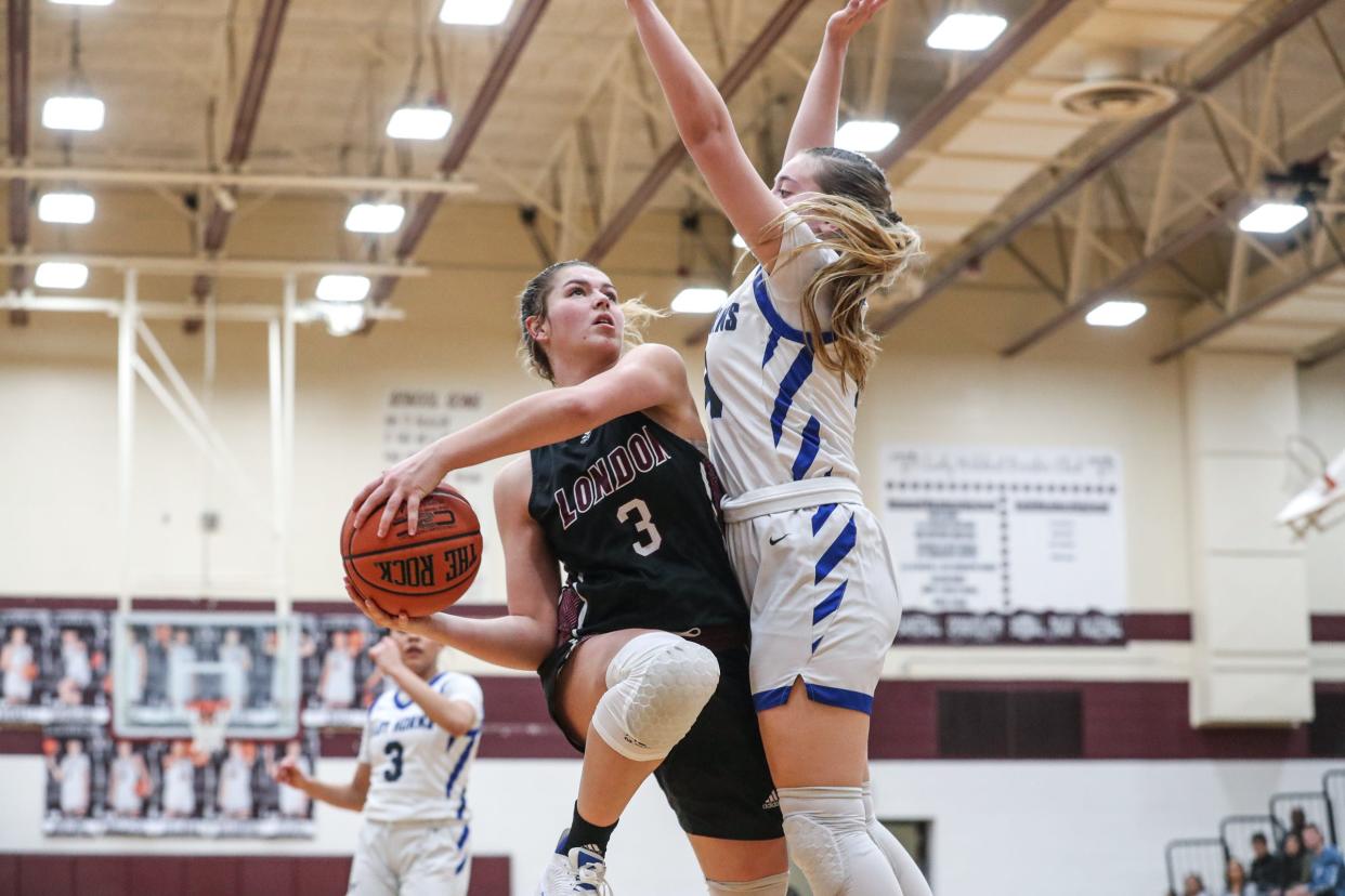 London's Corley Lewallen attempts a basket during the Class 3A bi-district game against George West at Calallen High School, on Tuesday, Feb. 14, 2023, in Corpus Christi, Texas.