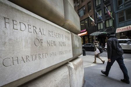 The corner stone of The New York Federal Reserve Bank is seen in New York's financial district March 25, 2015. REUTERS/Brendan McDermid