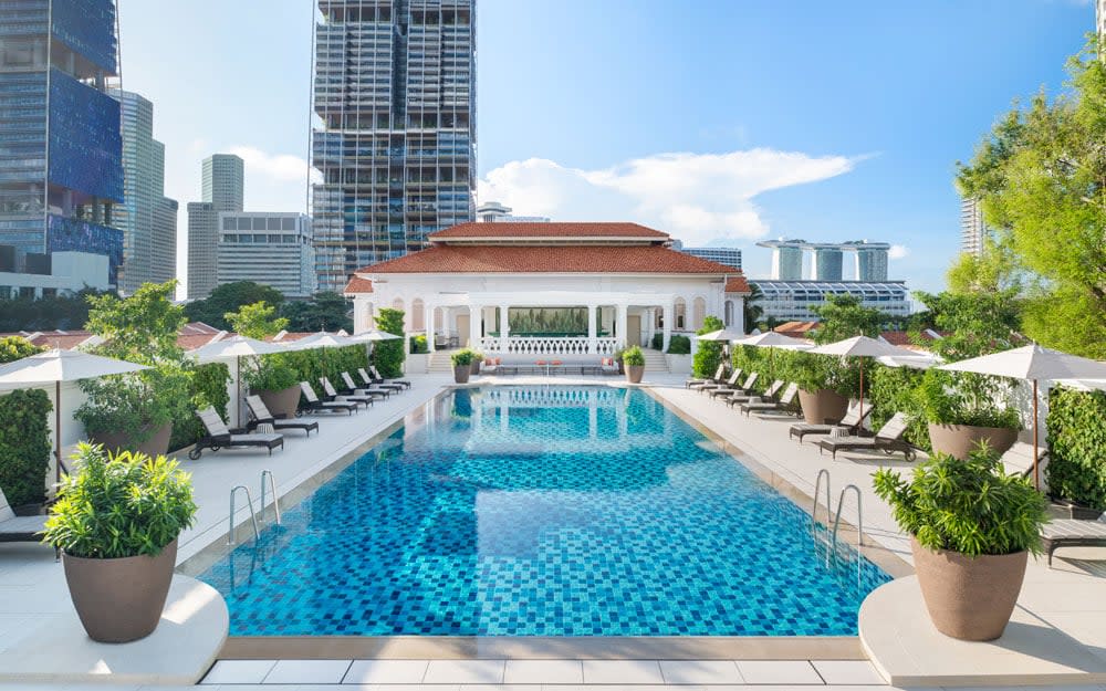 The rooftop swimming pool has been remodelled and now feels twice as large thanks to the addition of ivory-white floor tiles and outdoor furniture - TOOTEN