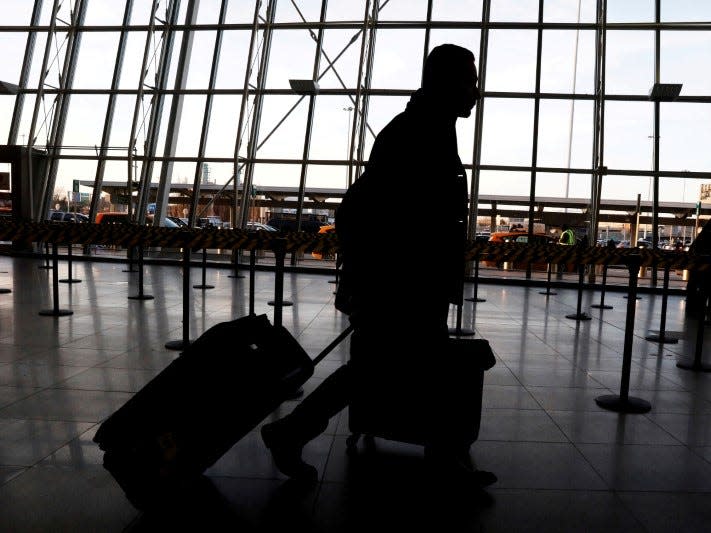 FILE PHOTO: International travelers arrive at John F. Kennedy international airport in New York City, U.S., February 4, 2017.  REUTERS/Brendan McDermid