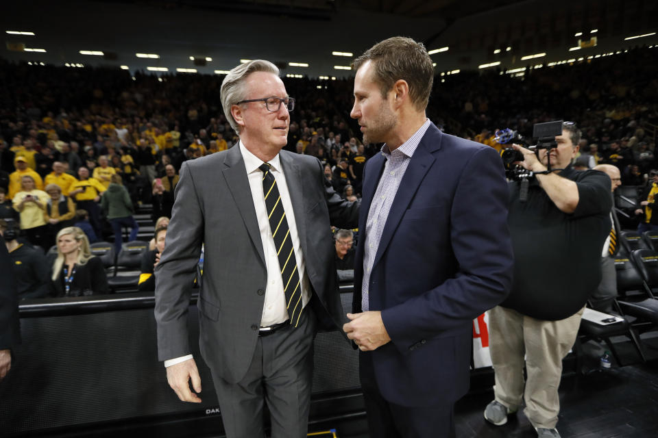 Iowa head coach Fran McCaffery, left, greets Nebraska head coach Fred Hoiberg before an NCAA college basketball game, Saturday, Feb. 8, 2020, in Iowa City, Iowa. (AP Photo/Charlie Neibergall)