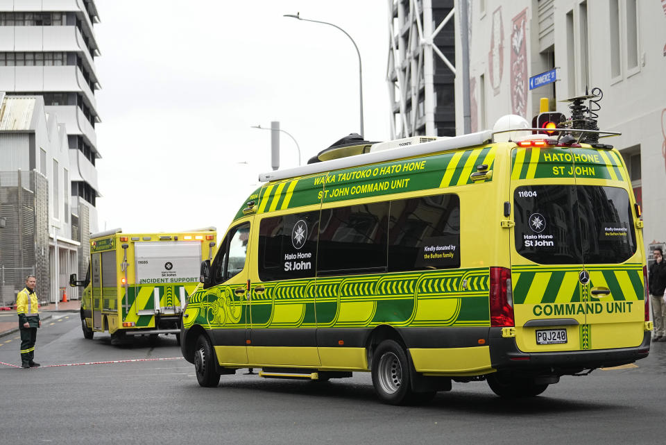 Ambulances arrive at the scene of a shooting in the central business in Auckland,New Zealand, Thursday, July 20, 2023. New Zealand police are responding to reports that a gunman has fired shots in a building in downtown Auckland.(AP Photo/Abbie Parr)