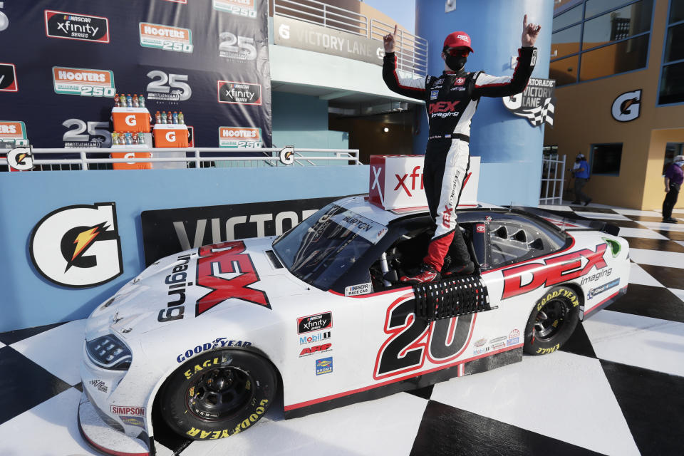 Harrison Burton celebrates after winning a NASCAR Xfinity Series auto race Saturday, June 13, 2020, in Homestead, Fla. (AP Photo/Wilfredo Lee)