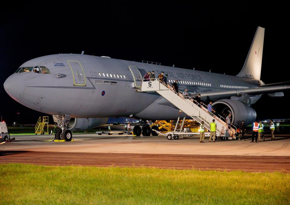 An Airbus A330 Multi Role Tanker Transport deplaning Afghan nationals at a base in the UK after evacuating them from Kabul after the Taliban takeover in 2021.