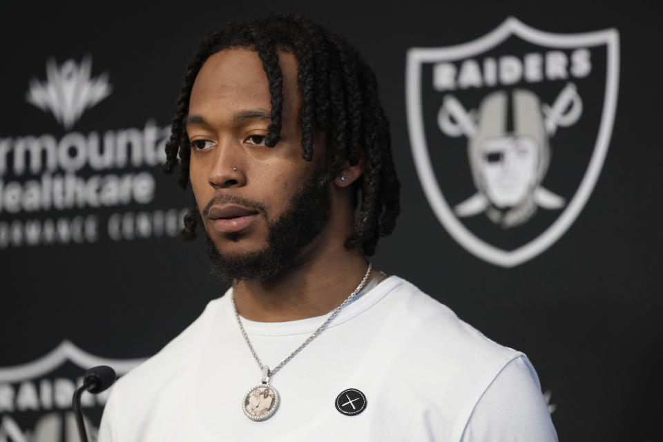 Las Vegas Raiders wide receiver Jakobi Meyers takes questions from reporters at an NFL football news conference Thursday, March 16, 2023, in Henderson, Nev. (AP Photo/John Locher)