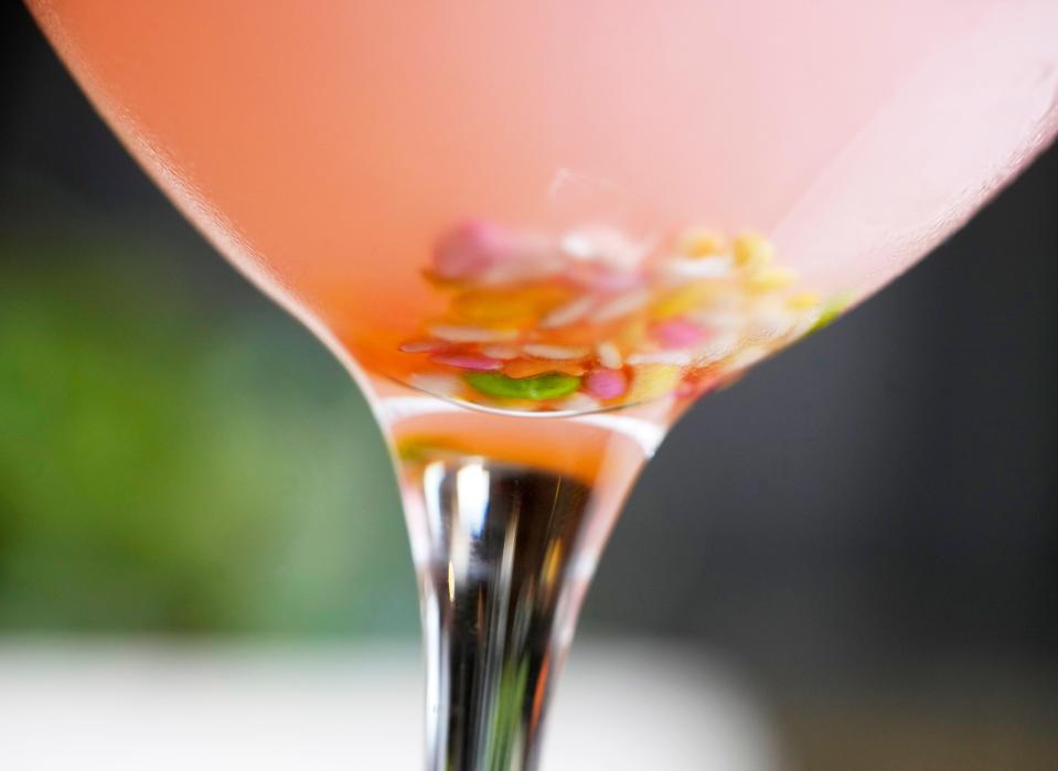 Agni's masala sour cocktail is garnished with candied fennel.