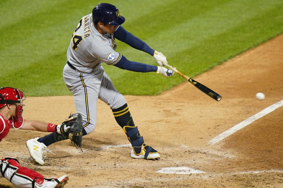 Milwaukee Brewers' Avisail Garcia hits a two-run single off Philadelphia Phillies pitcher JoJo Romero during the fifth inning of baseball game, Wednesday, May 5, 2021, in Philadelphia. (AP Photo/Matt Slocum)